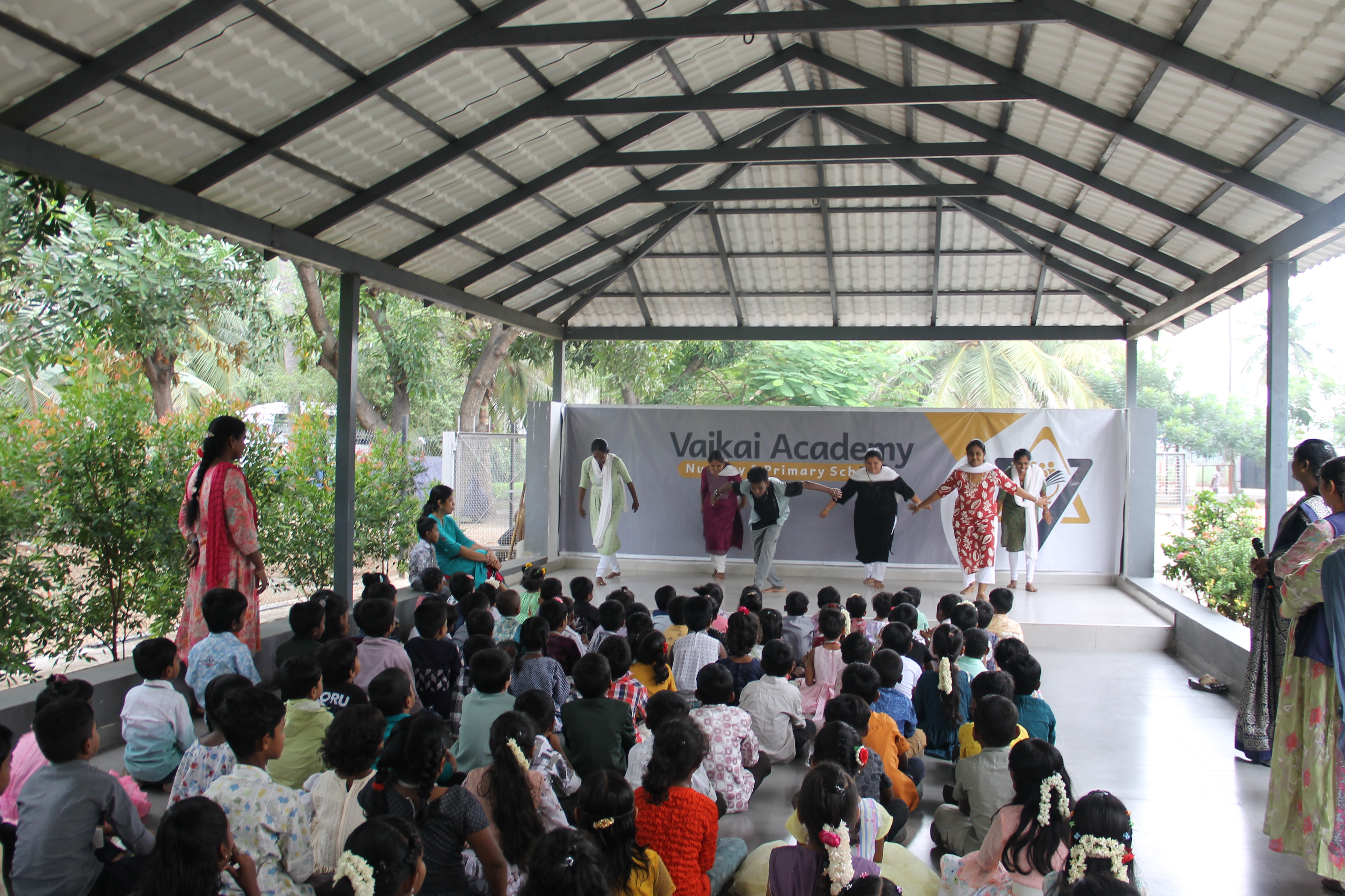 Teacher's performing for the kids on Children's Day